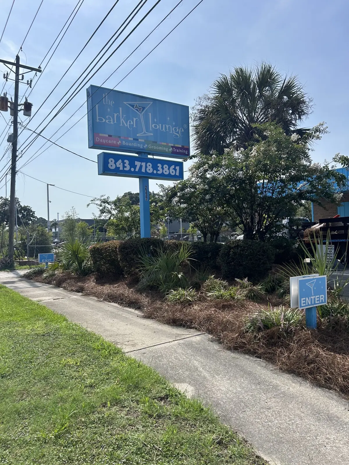 A pet daycare property with a fresh landscape bed